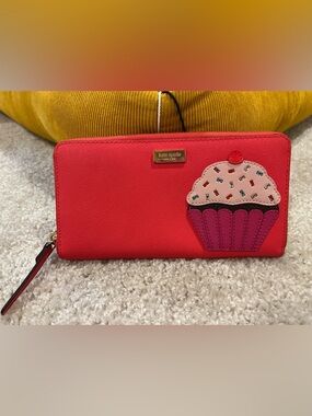 kate spade red zip-around wallet with cupcake applique